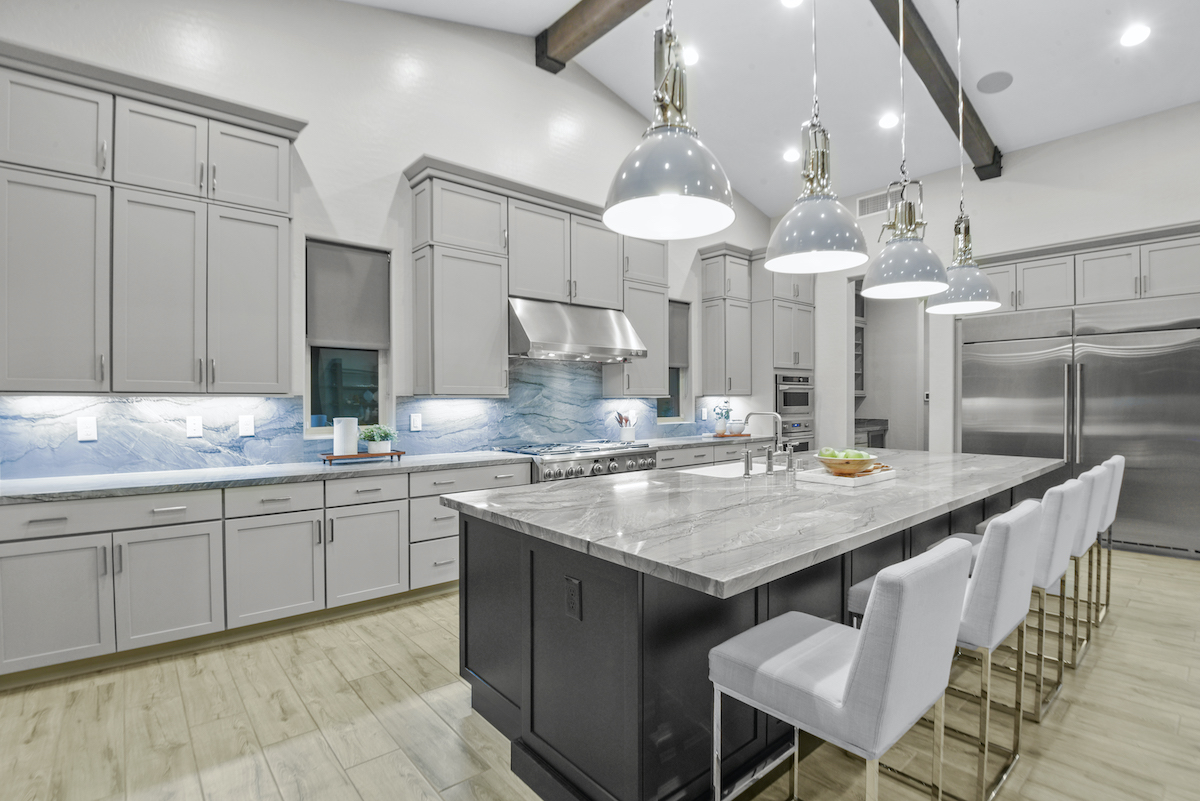 Elegant kitchen in Summerlin staged home with sleek modern design. | Utopia Luxury Home Staging & Design