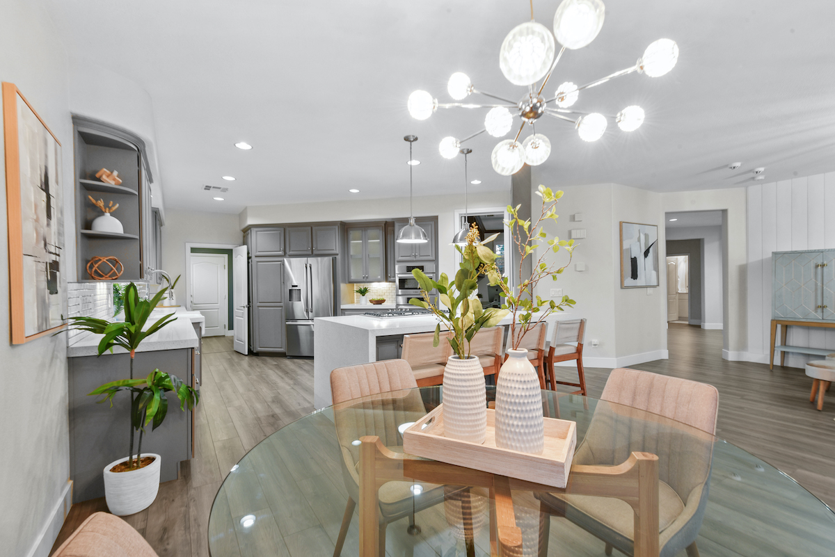 Case Studies 16 | Luxury Home Staging & Design in Las Vegas Elegant Summerlin staged home with a chic open-plan kitchen and dining area | Utopia Luxury Home Staging & Design