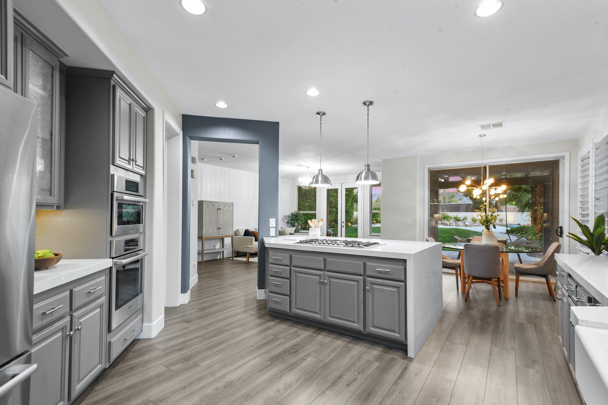 Case Studies 18 | Luxury Home Staging & Design in Las Vegas Modern kitchen in Las Vegas home staging with open dining area. | Utopia Luxury Home Staging & Design