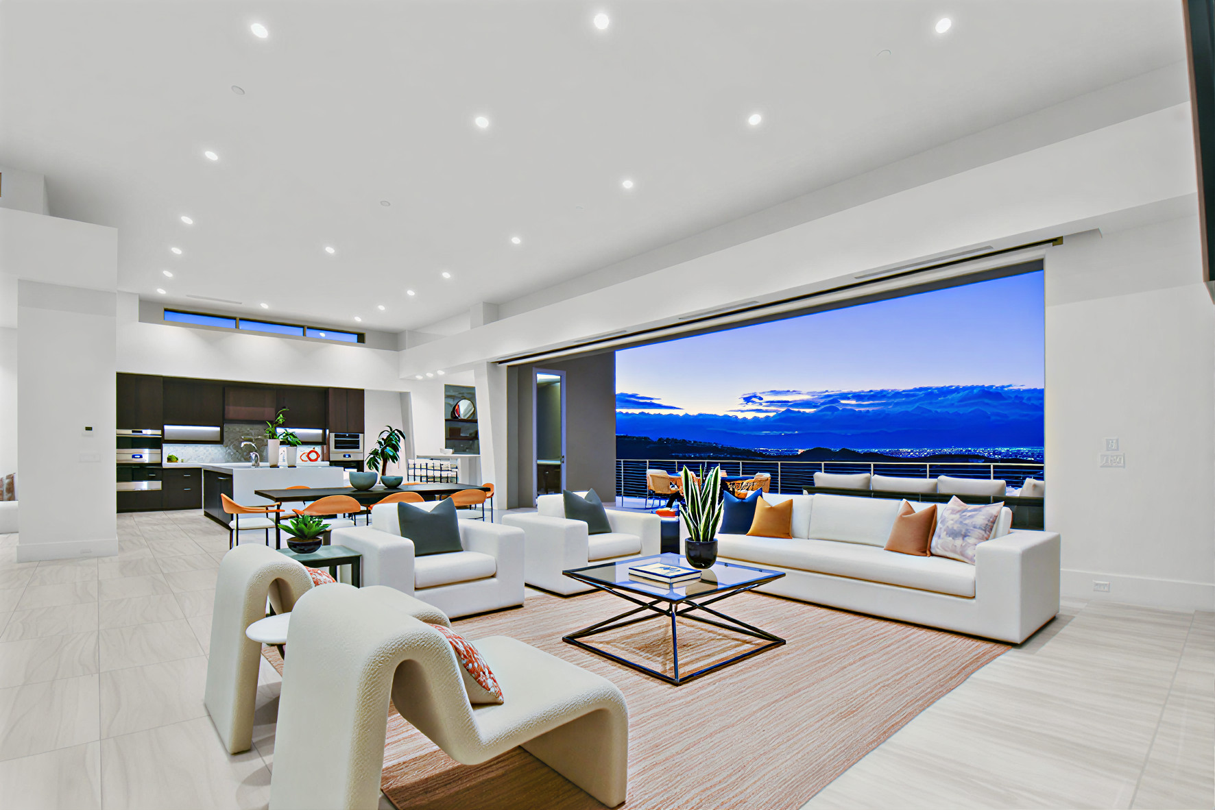 Henderson luxury staging in a modern, open-concept living area with a view. | Utopia Luxury Home Staging & Design