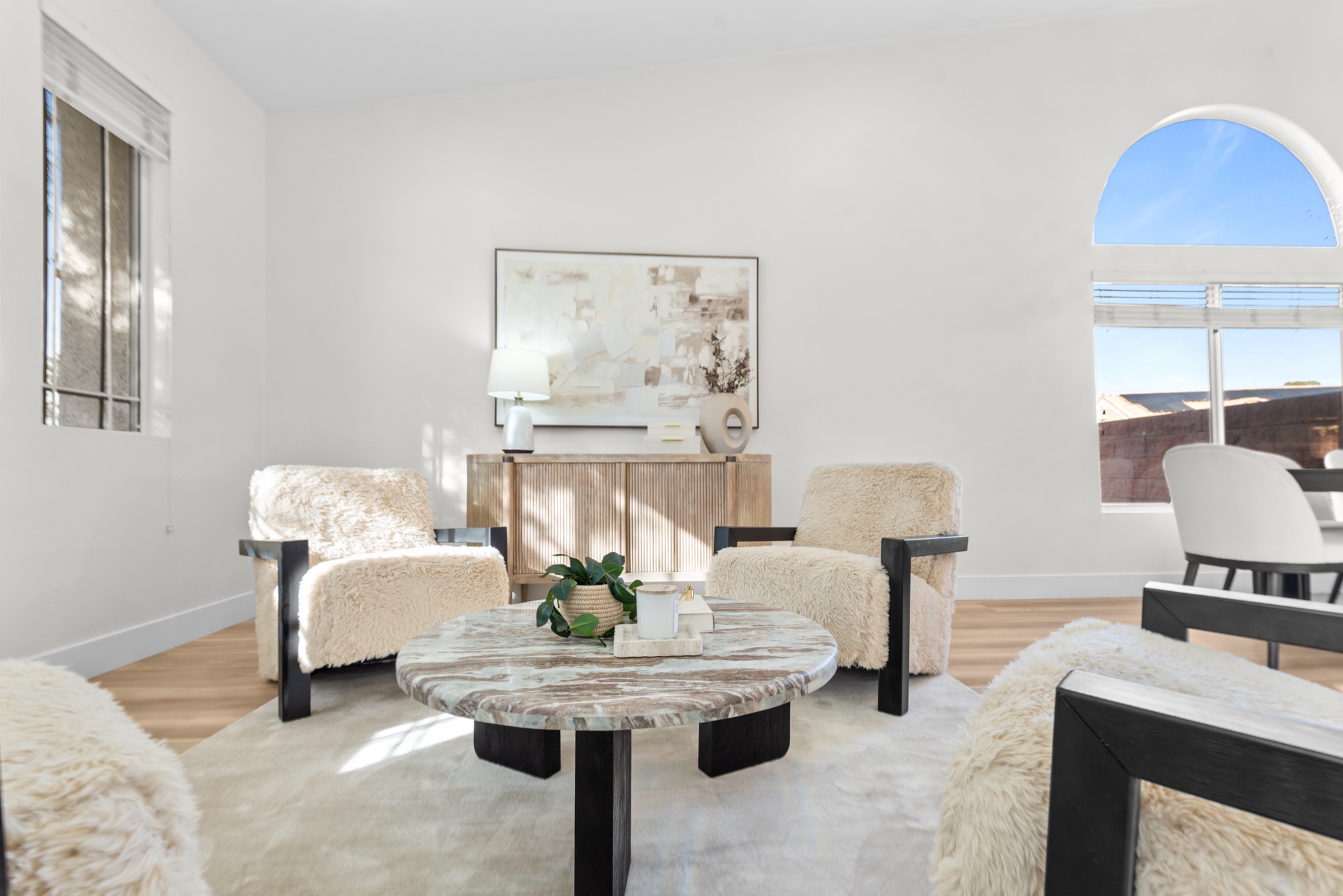 Staged luxury living room showing presentation quality that maximizes price in seller and buyer markets