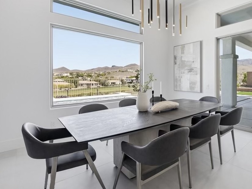Las Vegas dining room staging at 18 Brookridge Dr with mountain views