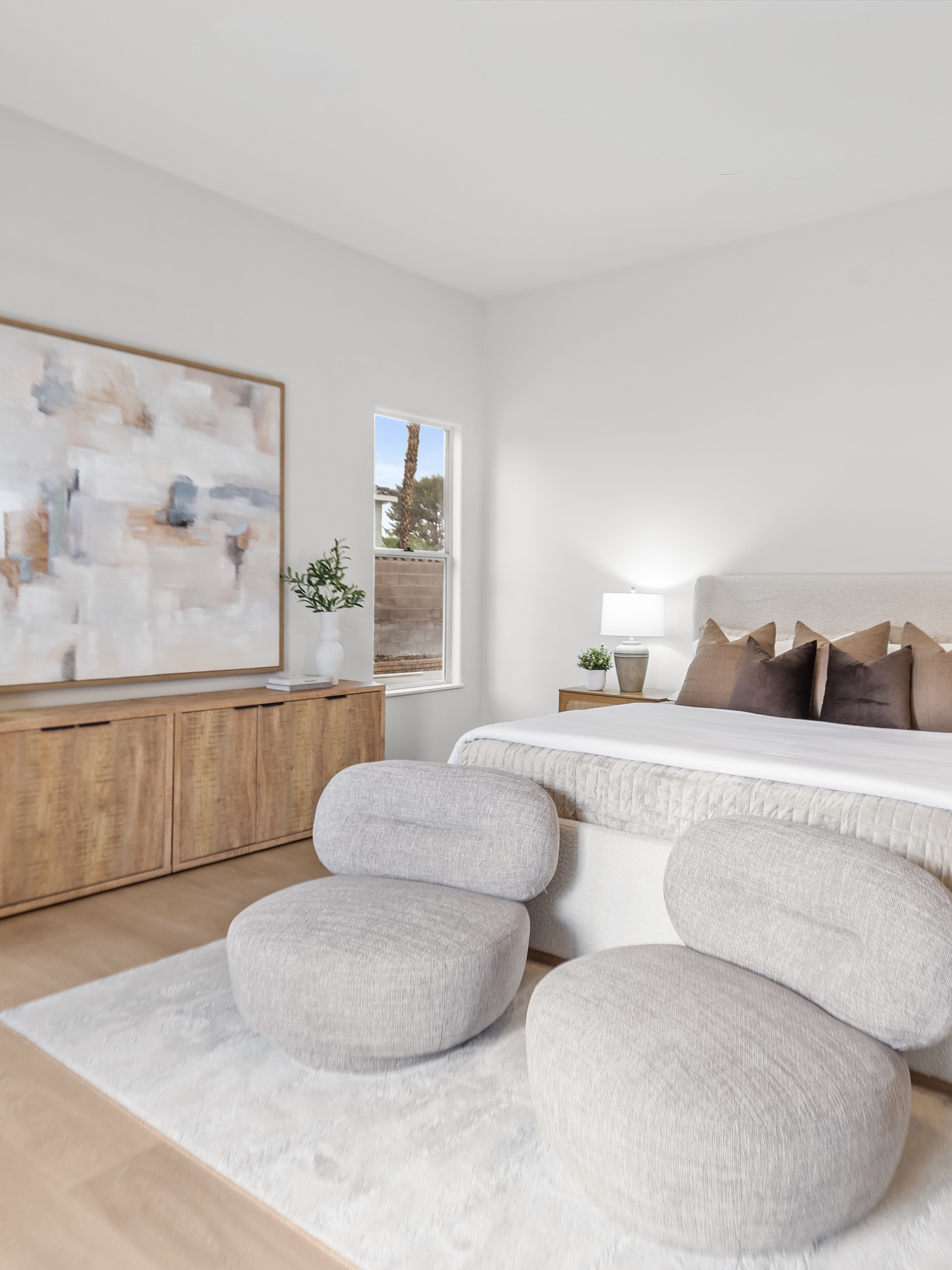 Staged primary bedroom in Las Vegas listing — calm neutral palette demonstrating staging quality after the seller expectations conversation