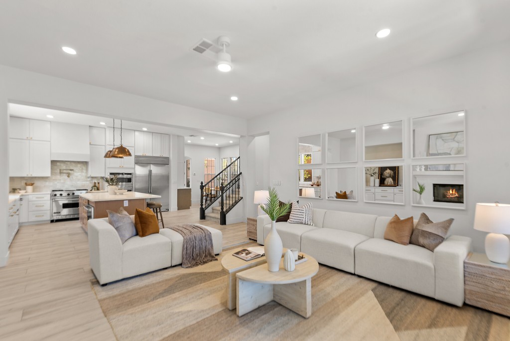 Comparing home staging quotes in Las Vegas — professionally staged open-concept living room by Utopia Home Staging